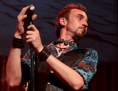 Christian Doyle performing at the Harlequin Theatre in Olympia, Washington.