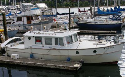 The boat Moon Glow outside the Budd Bay Cafe in Olympia, Washington.